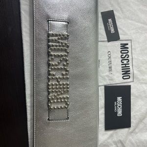 Rare Elongated Silver Leather Moschino Hand Slide Clutch Bag